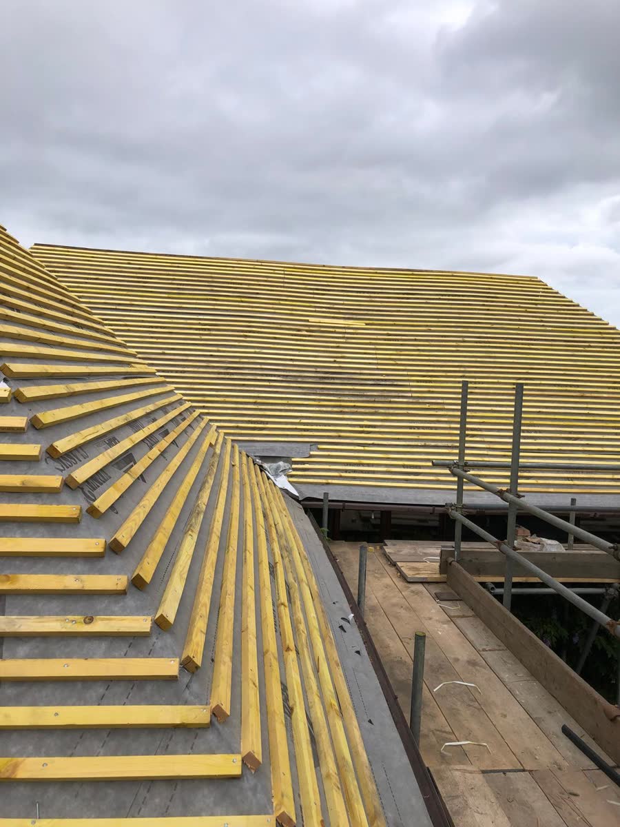 Battens set out on a hip roof ready for tiles in Yate