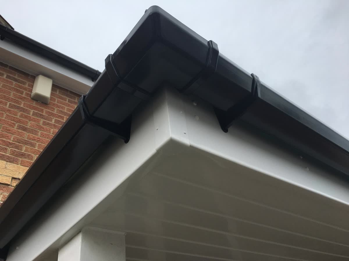 Black fascia with a white soffit underneath in Sea Mills