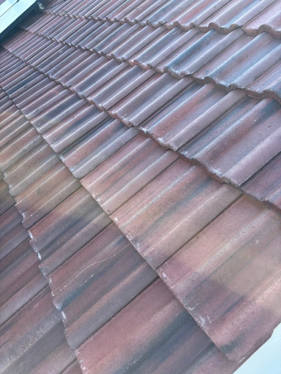 Close view of weathered clay roof tiles in Avonmouth
