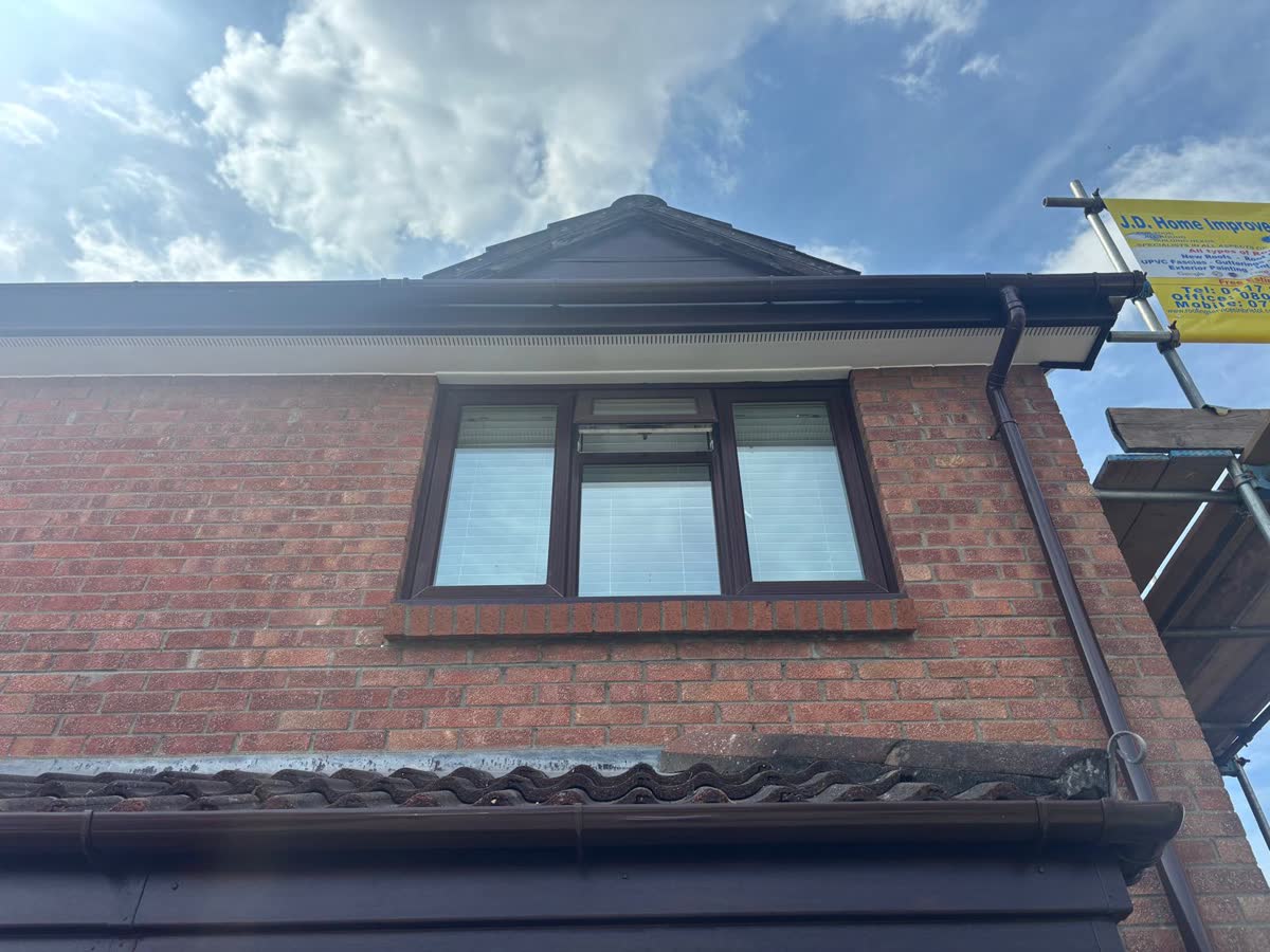 Fascia work on a house under scaffold in Bradley Stoke