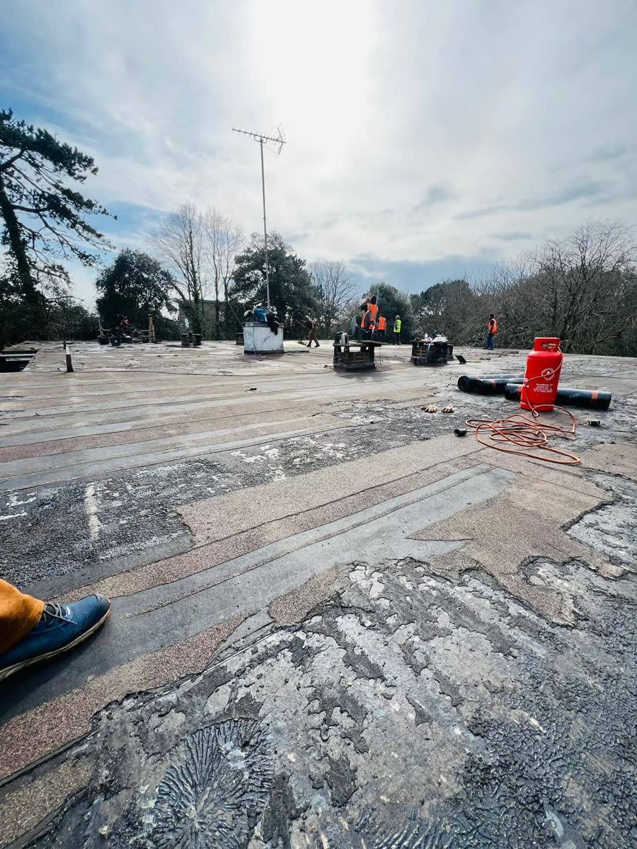 Flat roof stripped back to the deck in Yate