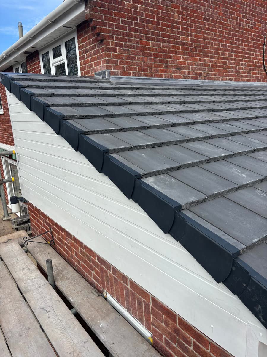 Grey tiled roof finished at the verge in Bradley Stoke