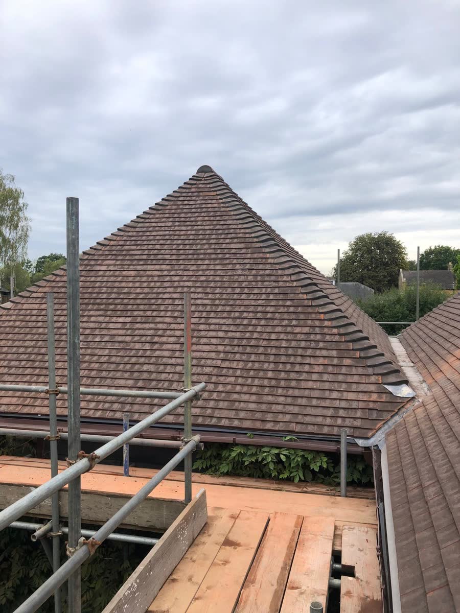 Plain tile hip roof seen from the scaffold in Bishopston