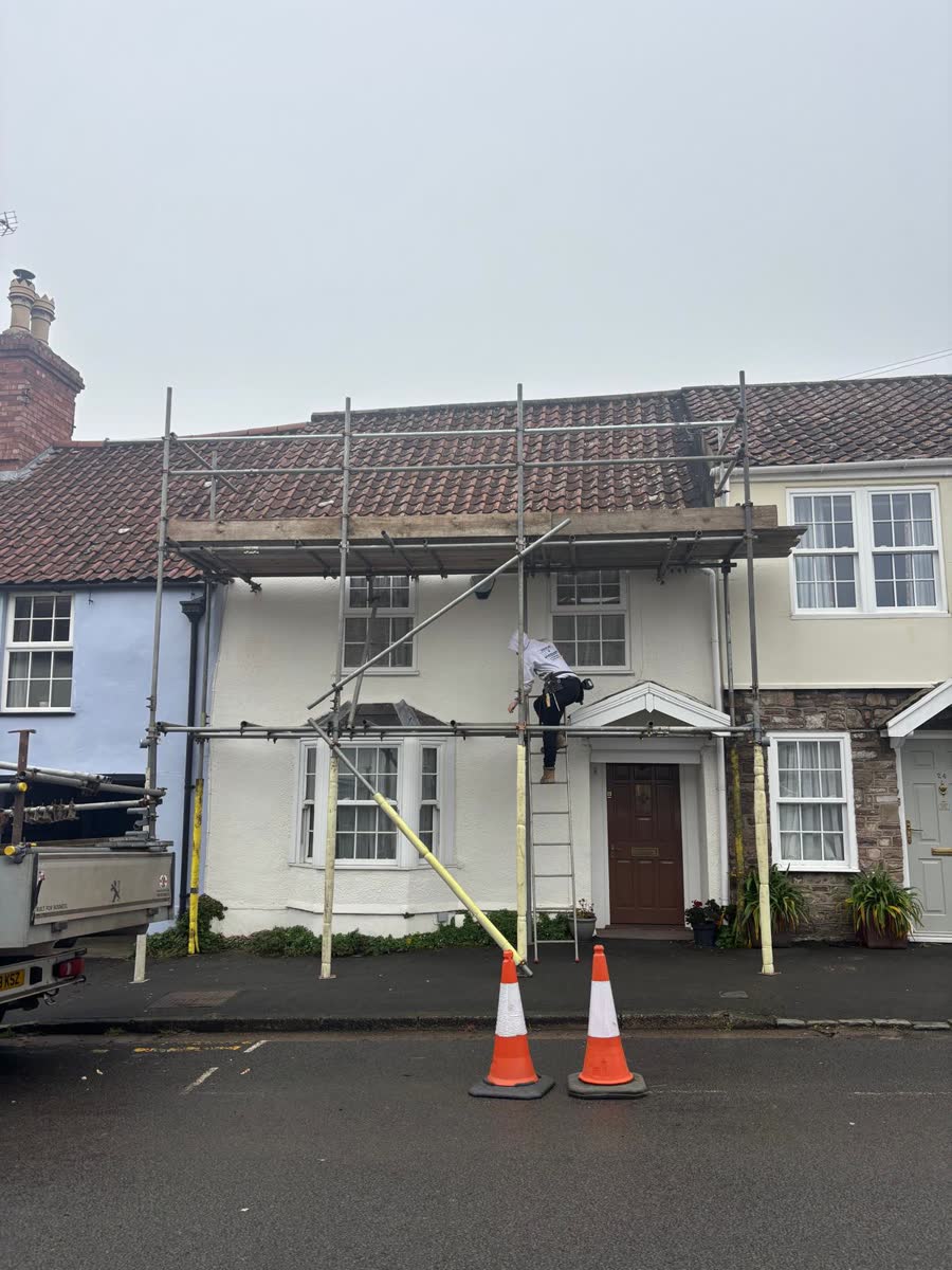 Scaffold and safety cones outside a house in Kingswood