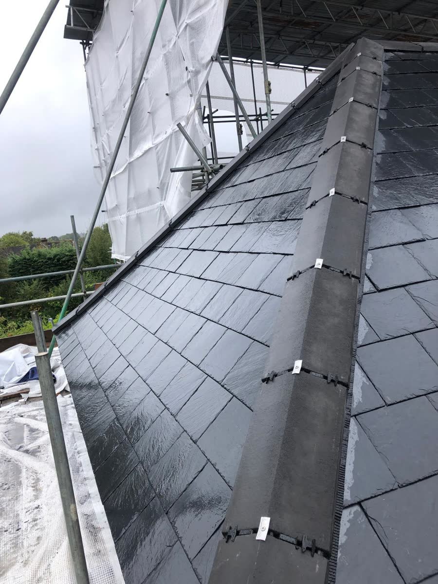 Slate hip ridge with scaffold alongside in Clifton