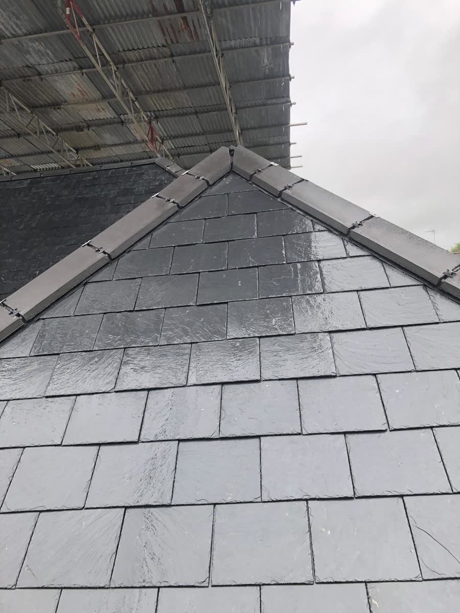 Slate roof with a new ridge line in Henleaze
