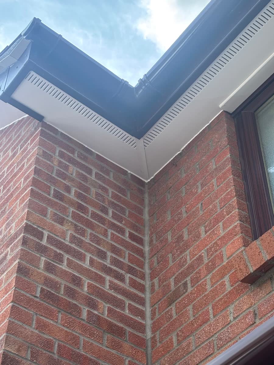 White soffit and black gutter on an internal corner in Henleaze