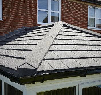 Charcoal tiled conservatory roof with a hipped ridge, Avonmouth