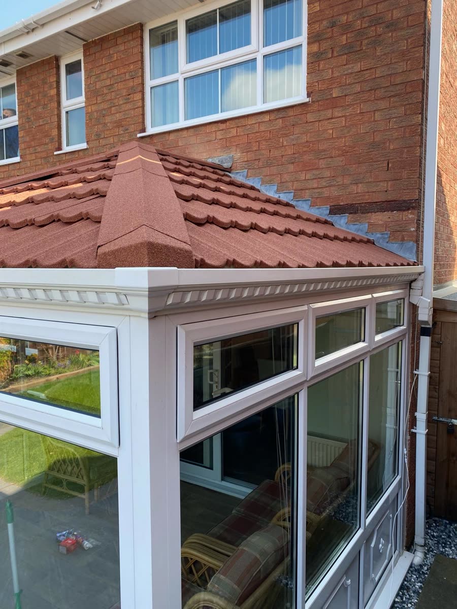 Conservatory with a new terracotta tiled roof, Clifton