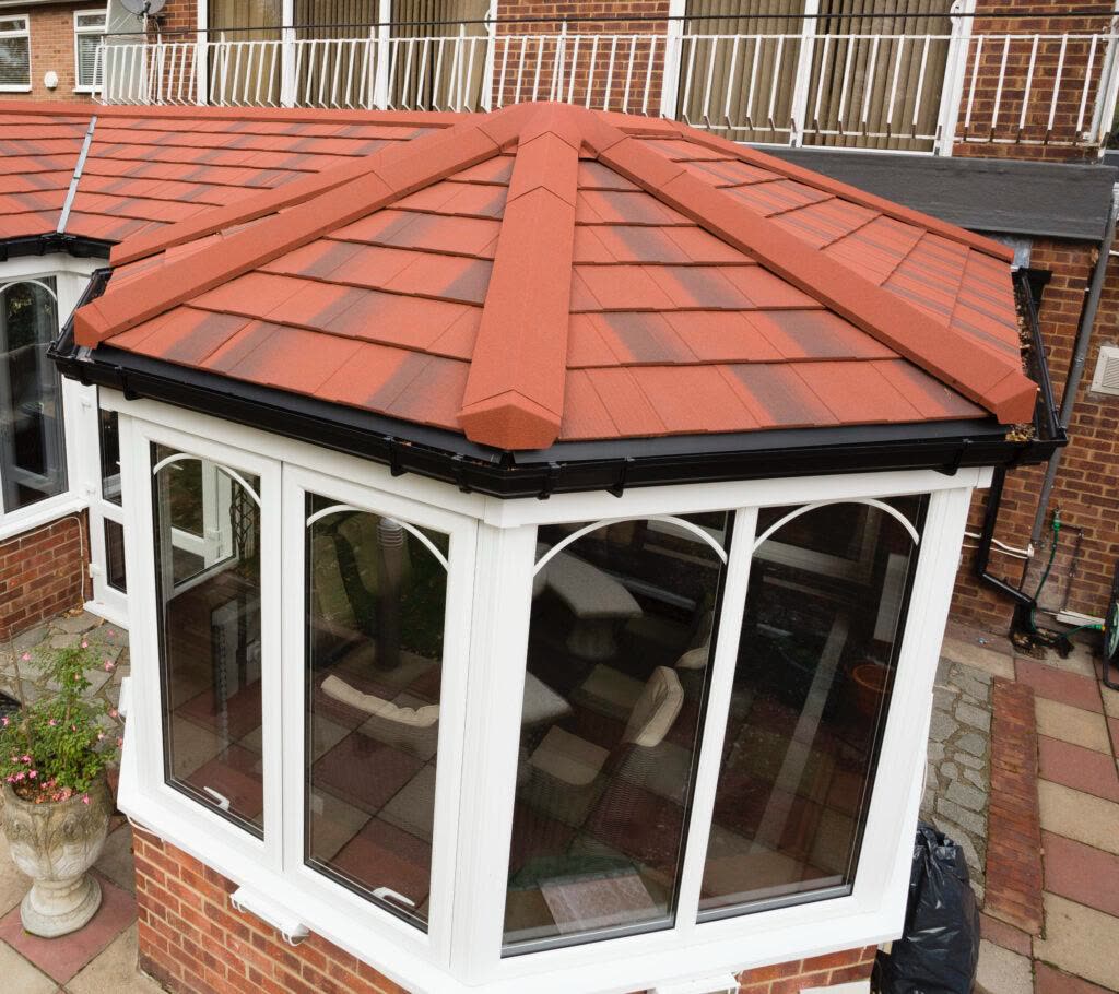 Terracotta tiled roof on a bay fronted conservatory, Portishead