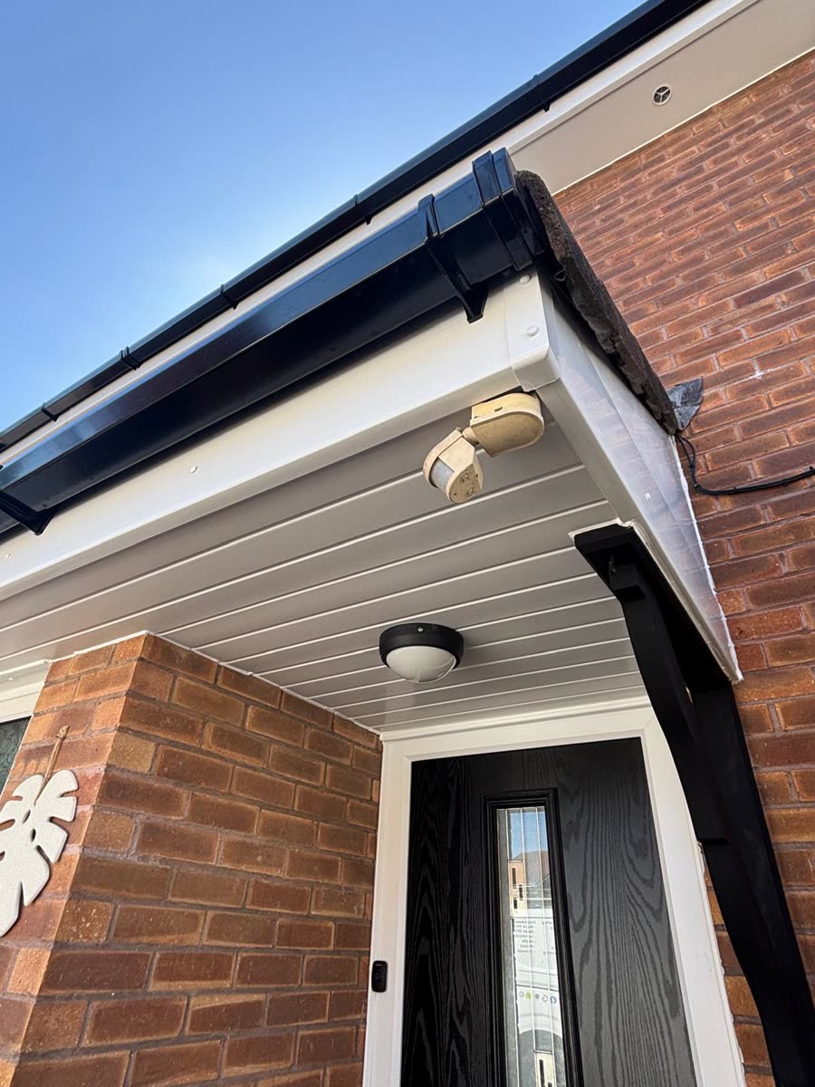 Porch canopy finished with black fascia and white soffit, Keynsham
