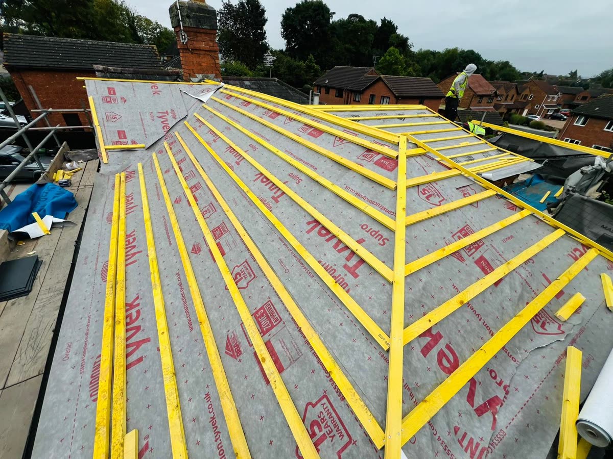 New membrane and battens across a roof with a valley in Cotham