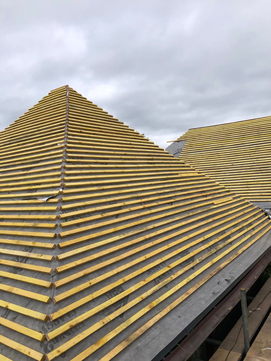 Breathable membrane and new battens on a hipped roof, Horfield