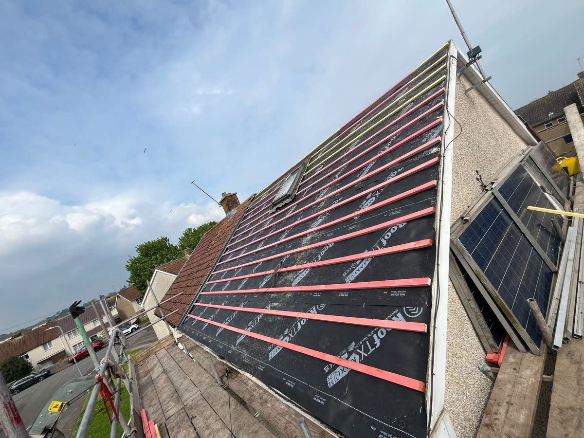 Membrane and battens on a re-roof with the solar panels lifted off, Lawrence Weston